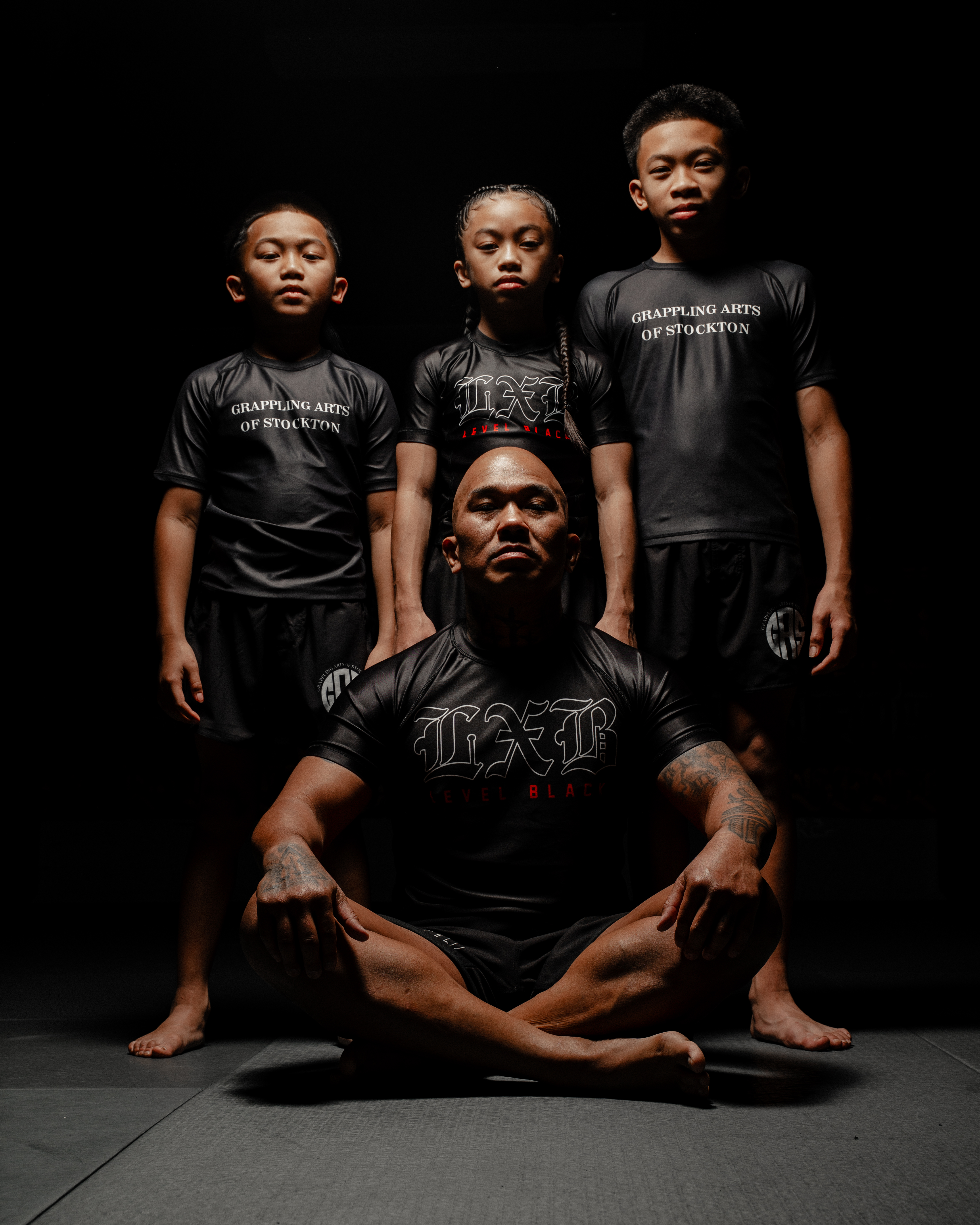 Head coach Fil and his children